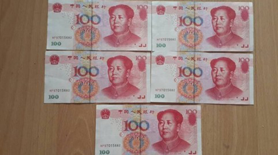北京銀行連取5張百元假幣 客戶自嘲“好運氣”